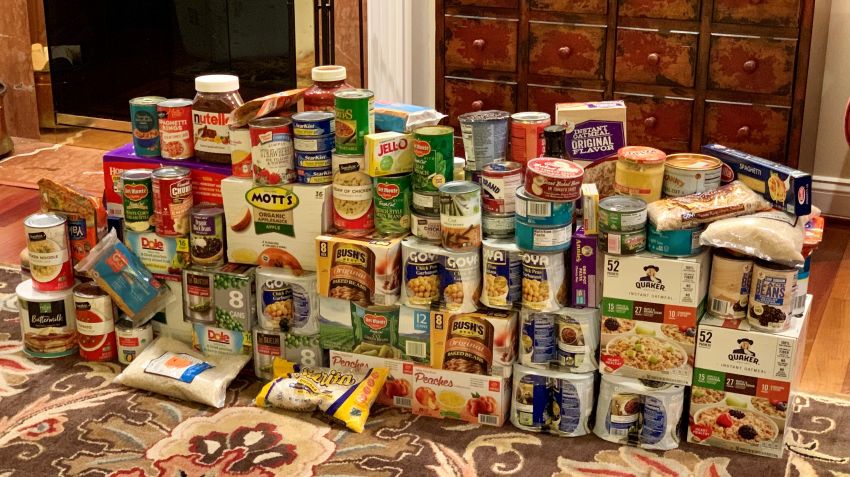 Council Members Contribute a Mountain of Food to Manna Food Center